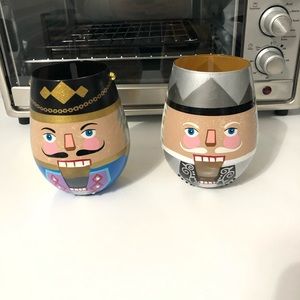 Hand painted Christmas nutcracker wine glasses.
